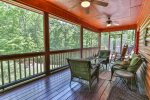 Enjoy a glass of wine and conversation on the screened deck